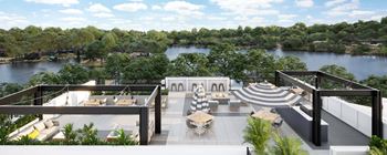 an artist impression of a rooftop terrace with tables and an umbrella and a lake